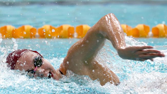 Ariarne Titmus swimming her way to a win at the Queensland Girls Secondary Sports Association 2018 swimming carnival, held at the Sleeman Sports Complex. Picture: AAP/Steve Pohlner