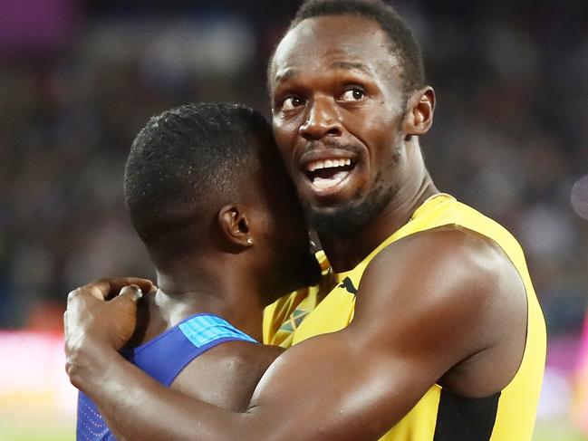 LONDON, ENGLAND - AUGUST 05:  Usain Bolt of Jamaica hugs Justin Gatlin of the United States following Gatlin's win in the Men's 100 metres final in 9.92 seconds during day two of the 16th IAAF World Athletics Championships London 2017 at The London Stadium on August 5, 2017 in London, United Kingdom.  (Photo by Alexander Hassenstein/Getty Images for IAAF)