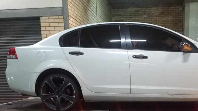 Police seized a white Holden Commodore on Maitland Rd, Cessnock, as part of ongoing inquiries of Strike Force Breve. Picture: NSW Police