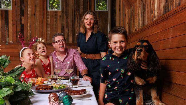 Michael and Rachel Worden, with Lois, 9, Scarlett, 6, and Oscar, 9, with Duke the dog, at The Gymea Hotel. Picture: Justin Lloyd.