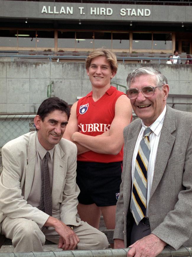 An Essendon dynasty: Allan Hird Jr, James Hird and Allan Hird Sr at the Hird stand at Windy Hill.