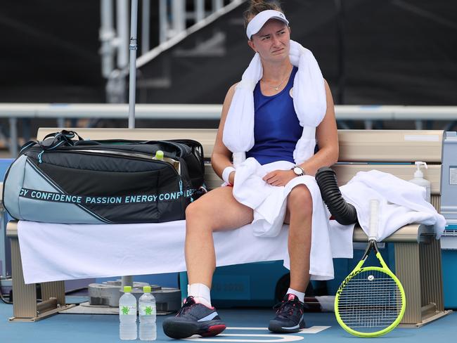 Barbora Krejcikova of Team Czech Republic attempts to keep cool between games during her Women's Singles Second Round match against Leylah Annie Fernandez of Team Canada. Picture: Getty Images