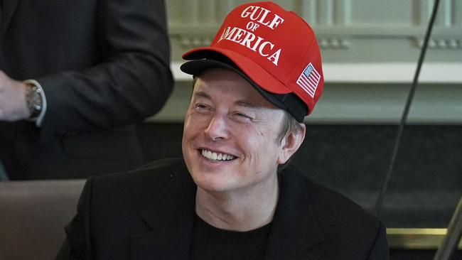 Elon Musk listens during a cabinet meeting at the White House, Wednesday, April 30, 2025, in Washington. (AP Photo/Evan Vucci)
