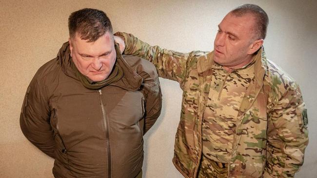 Dmitry Kozyura, head of counter-intelligence, is detained by Ukrainian spy chief Vasyl Malyuk.