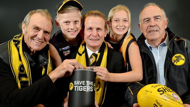 Glenelg legend Graham Cornes, fan Joe Chigwidden, Nick Chigwidden, fan Summer Ryan and Peter Carey at the launch of the club's 'Save the Tigers' fund in 2016. Picture: Bianca De Marchi