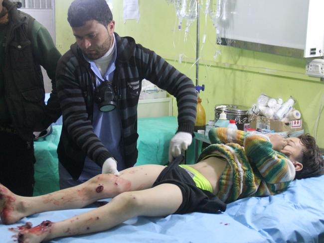 A Syrian child receives treatment at a hospital in Khan Sheikhun following the suspected attack which killed at least 58 civilians, including several children. Picture: Omar haj Kadour/AFP