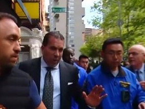 Donald Trump's lawyer clashed with reporter Tim Lester, on far right.