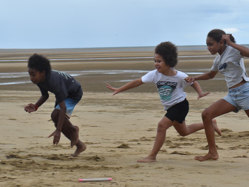 Esaias Woyse, Lyle Davis and Chloe Yasserie racing at the Mackay & District South Sea islander Association's 2022 Australia Day Celebrations in Quota Park. Picture: Lillian Watkins