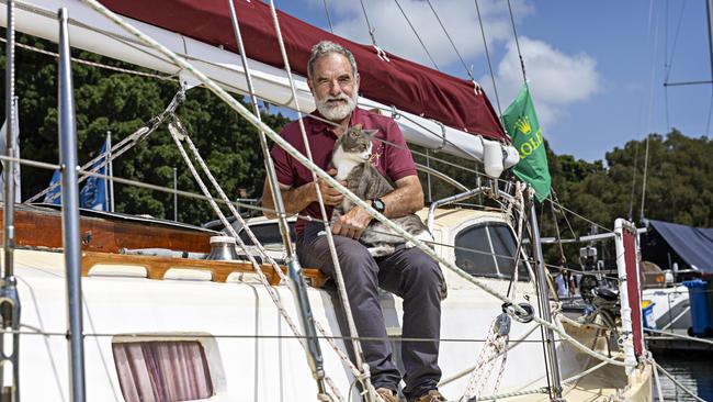 SYDNEY, AUSTRALIA, NOVEMBER 22, 2023. Sylph VI skipper and owner Robert â€˜Bobâ€™ Williams with his cat Oli who will sail with Bob in the Sydney to Hobart yacht race on board Sylph VI. Photographer: Adam Yip