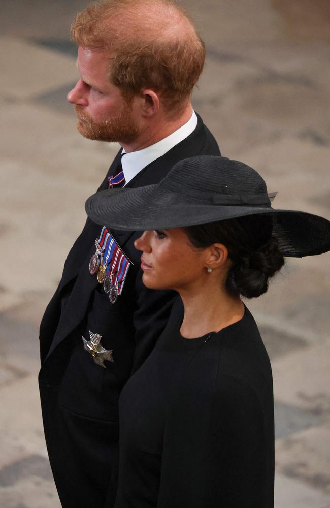 Britain's Prince Harry, Duke of Sussex and Britain's Meghan, Duchess of Sussex attend the state funeral and burial of Britain's Queen Elizabeth. Picture: AFP