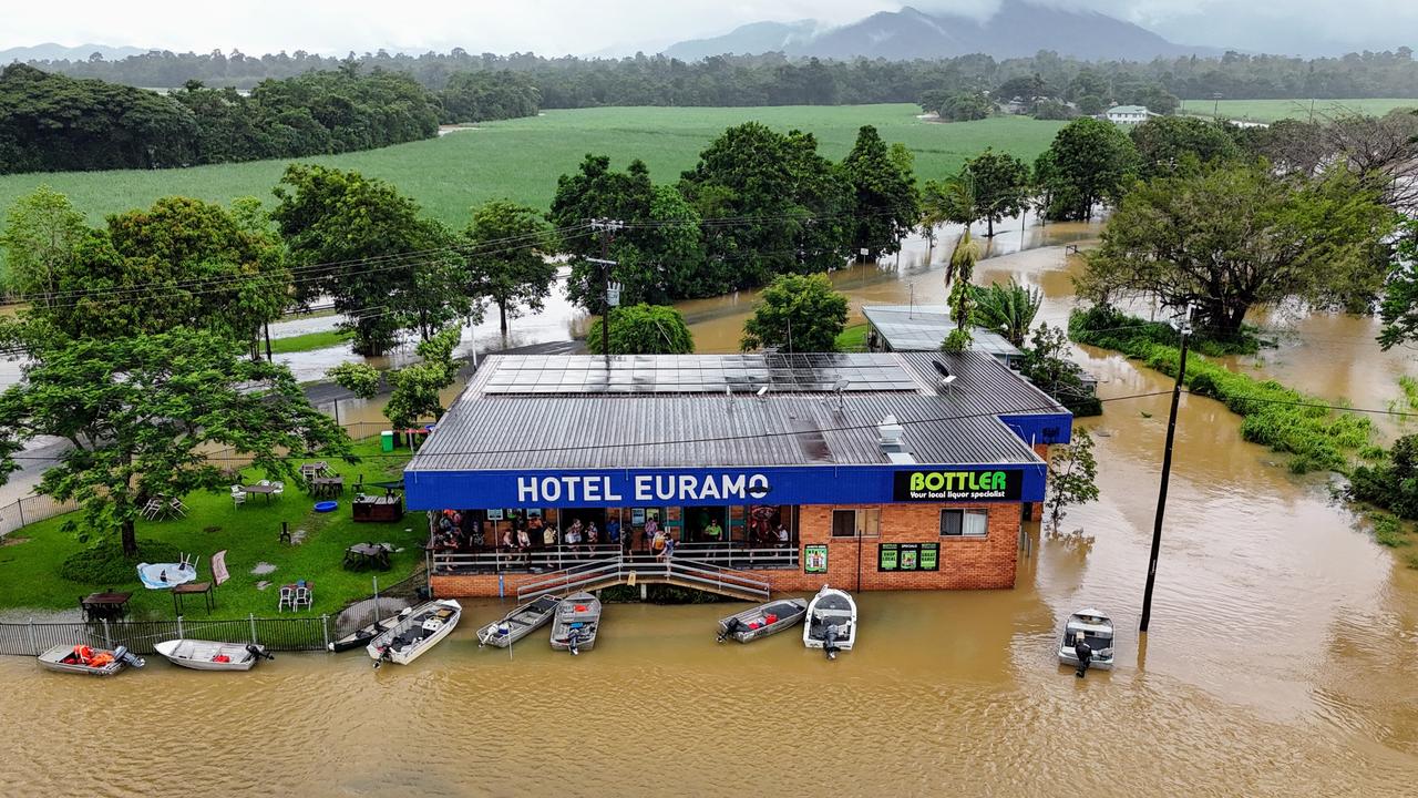 A monsoonal tropical low pressure system has bought devastating widespread flooding to North Queensland and parts of Far North Queensland, with over 700 millimetres of rain recorded in some areas and more wet weather forecast for the region. Flood water laps at the doorstep of the Hotel Euramo, with thirsty locals taking the boat or tinnie to the famous pub for their Sunday afternoon beer. Picture: Brendan Radke