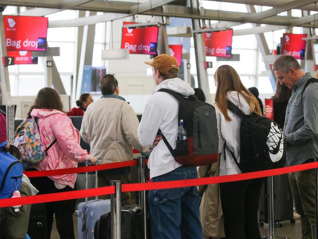 SYDNEY, AUSTRALIA - Newswire Photos - JULY 03 2023: A general view of Sydney Domestic Airport on the first day of school holidays which sees cancellations and delays of some flights due to poor weather and queues of people in Sydney. Picture : NCA Newswire / Gaye Gerard