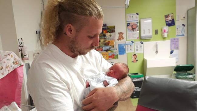 Proud dad Jake Groom with his tiny daughter Imelda at Mater Mothers. Pictures: Mater Mothers