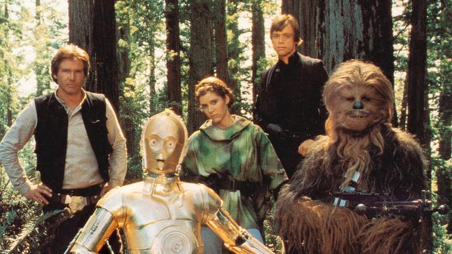 C-3PO with the original Star Wars crew, Han Solo, Princess Leia, Luke Skywalker and Chewbacca the Wookiee. Picture: Lucasfilm