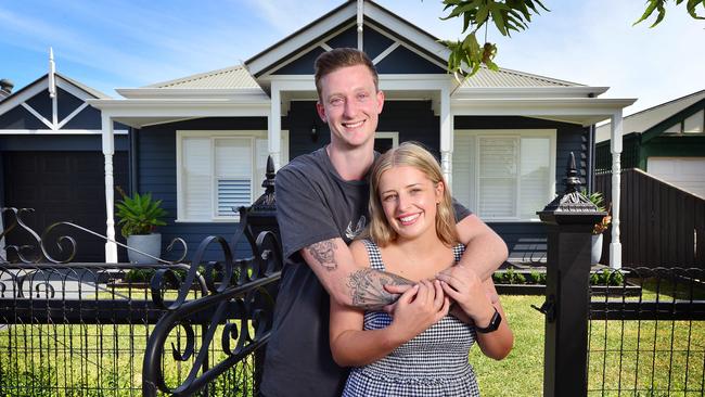 Connor Menadue and Zoe Collier at their first home in Point Cook, where buyers splashed almost $485m on houses this year. Picture: Nicki Connolly