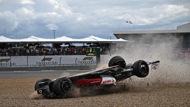 Guanyu’s car slid across the gravel and over the safety barrier. Picture: Ben Stansall/AFP