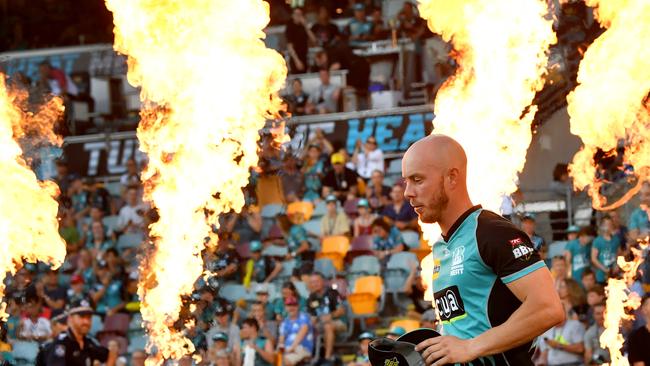 Chris Lynn of the Heat is seen running onto the field at the start of the Big Bash League (BBL) match between the Brisbane Heat and the Sydney Thunder at The Gabba in Brisbane, Thursday, January 17, 2019. (AAP Image/Darren England) 