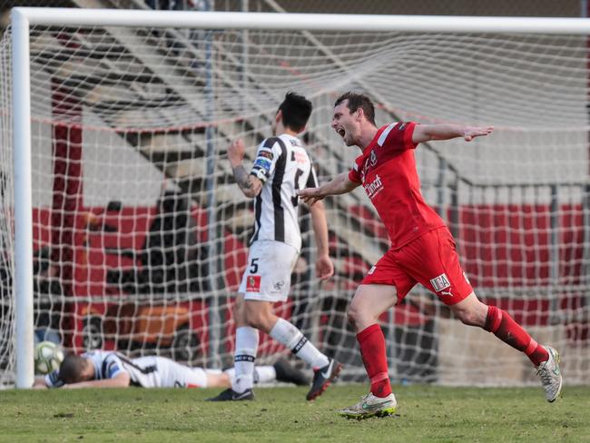 Campbelltown City’s Alex Mullen, pictured celebrating a goal earlier this season, opened the Red Devils’ scoring against Canberra FC. Picture: Adam Butler.