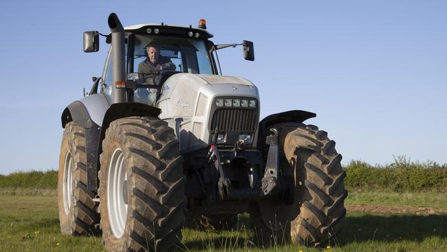 Jeremy Clarkson with his Lamborghini tractor on his farm. Picture: Emily Clarkson.