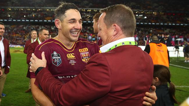 Billy Slater and Kevin Walters celebrate Queensland’s State of Origin triumph.