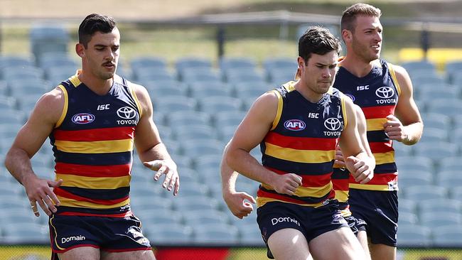 Adelaide’s Taylor Walker, left, Mitch McGovern and Daniel Talia at training. Picture: Sarah Reed