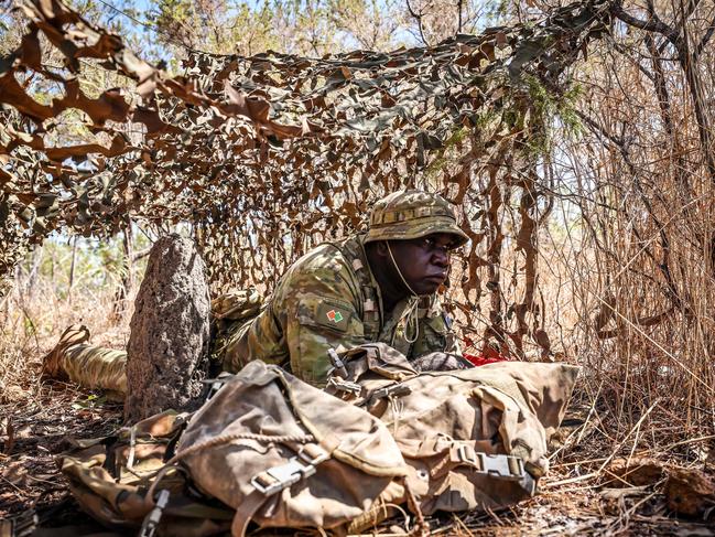 A soldier from the North-West Mobile Force participates in a training exercise in Darwin. The regiment includes some 1,300 soldiers from Indigenous communities who bring skills such as hunting and tracking passed down through generations. Picture: David Gray/AFP