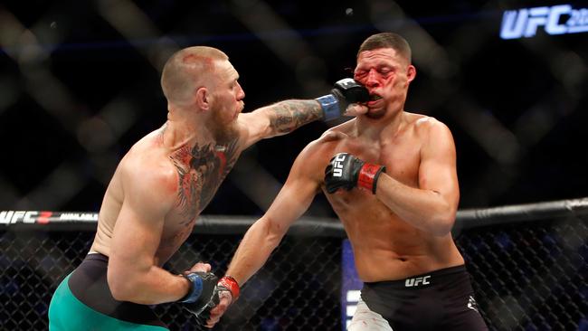 Conor McGregor (L), in action against Nate Diaz, is now the biggest drawcard in the UFC.