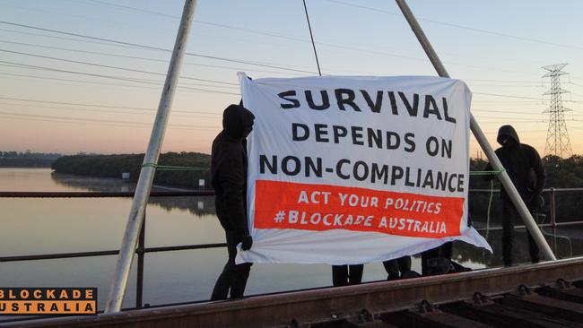 Blockade protesters on the Kooragang Rail Bridge over the Hunter River this week. Picture: Blockade Australia