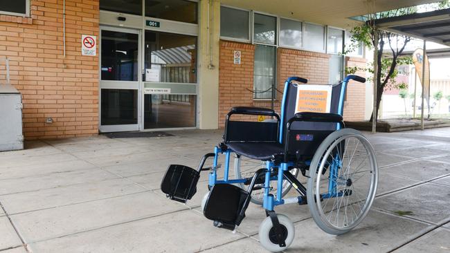 A wheelchair left outside empty clinical rooms at the Repat. Picture: AAP / Brenton Edwards