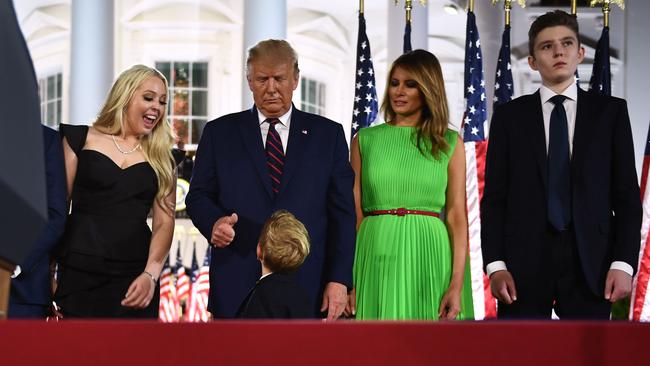 Doanld Trump — flanked by daughter Tiffany, wife Melania and son Barron — gives the thumbs up to grandson Theodore James Kushner after delivering his acceptanceon the South Lawn of the White House on Thursday night. Picture: AFP