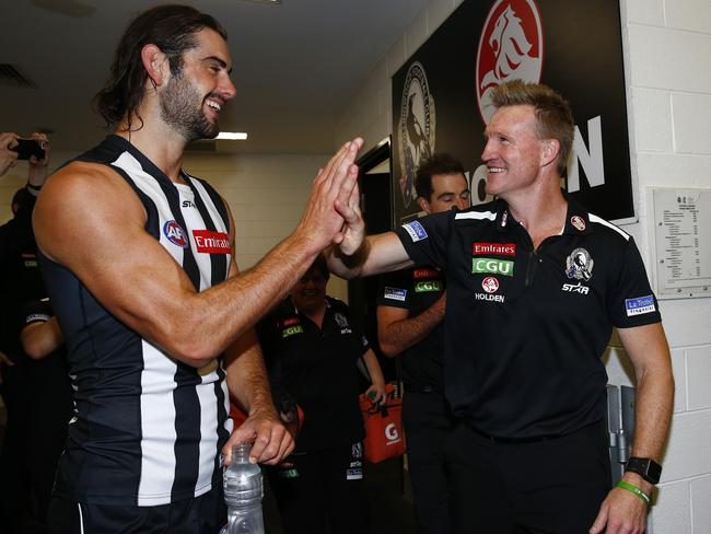 Nathan Buckley with matchwinner Brodie Grundy after Collingwood’s one-point win against Richmond. Picture: Colleen Petch
