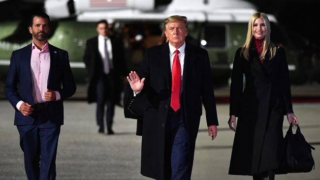 Former president Donald Trump, centre, daughter Ivanka Trump and son Donald Trump Jr. Picture: Mandel Ngan