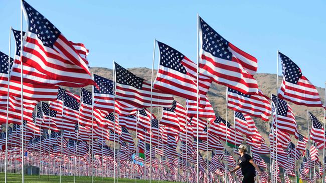 US flags to commemorate the victims of the 9/11 attacks. Picture: AFP.