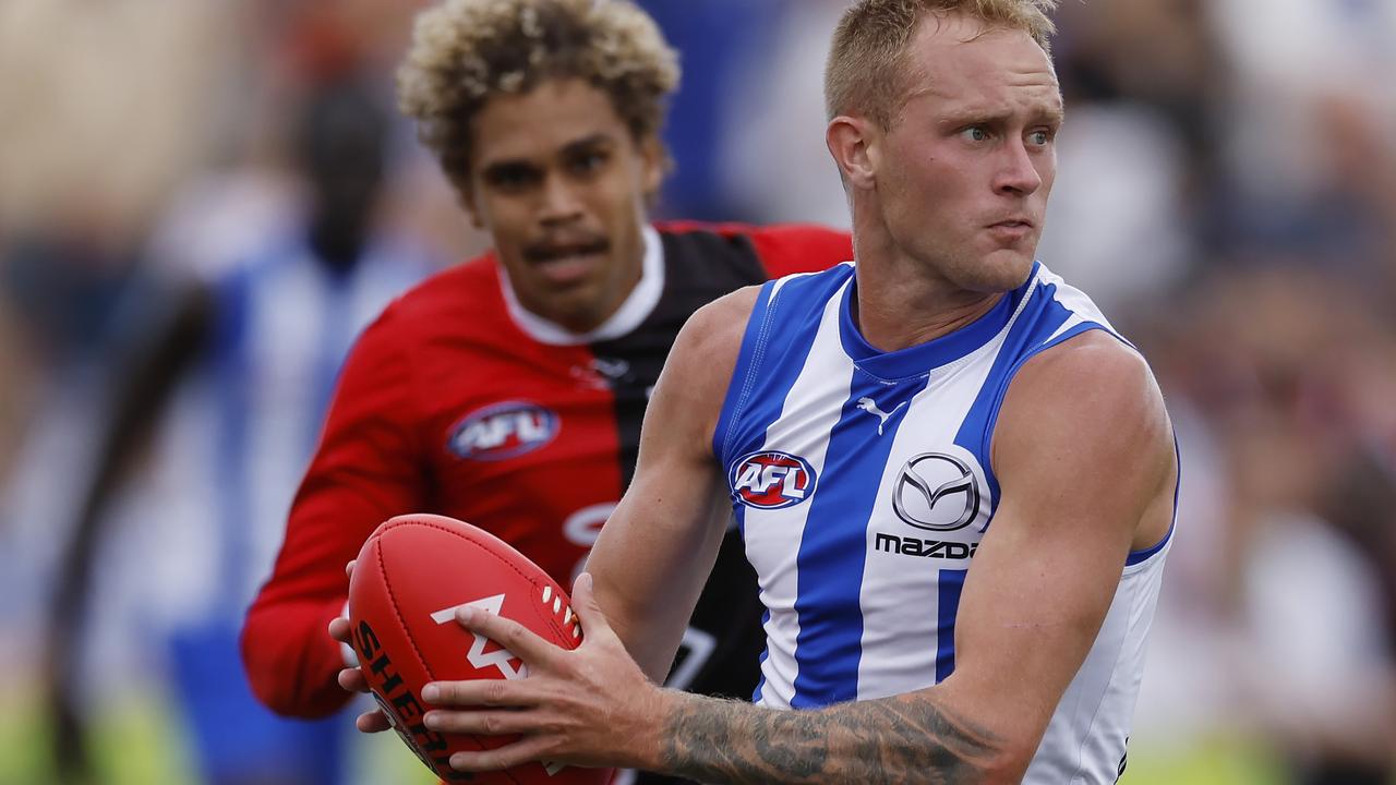 Retired AFL Roo bounds home