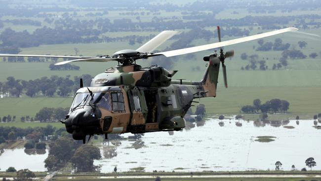 An Australian Army MRH90 Taipan helicopter from 6th Aviation Regiment conducts reconnaissance at Shepparton, Victoria, as part of Operation Flood Assist 2022.