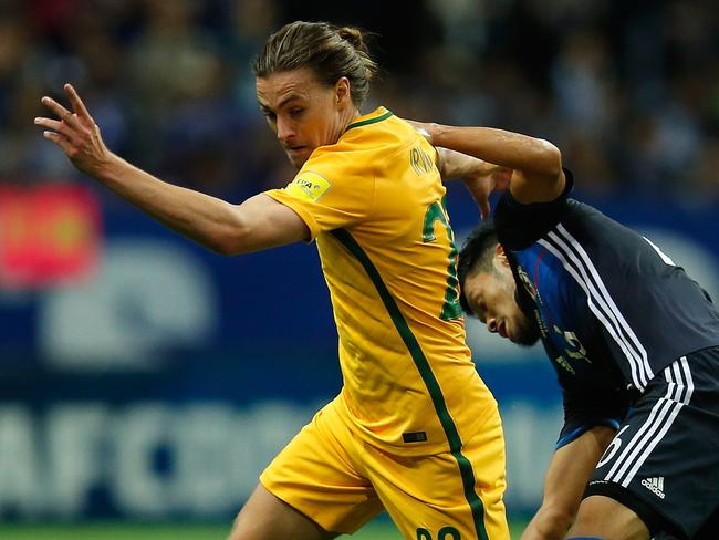 SAITAMA, JAPAN - AUGUST 31:  Jackson Irvine of Australia controls the ball under pressure of Hotaru Yamaguchi of Japan during the FIFA World Cup Qualifier match between Japan and Australia at Saitama Stadium on August 31, 2017 in Saitama, Japan.  (Photo by Kiyoshi Ota/Getty Images)