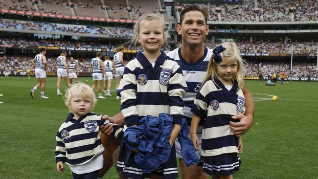 Tom Hawkins with his family on the MCG before game 350. Picture: Michael Klein