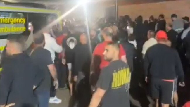 Angry crowds gathering outside the Assyrian Aramaic Church in Western Sydney following the stabbing of Bishop Mar Mari Emmanuel. Picture: Supplied