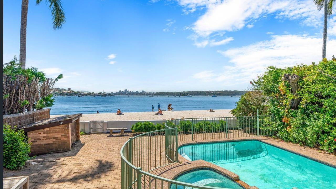 The pool has seen better days, but you can step straight out onto the sand.