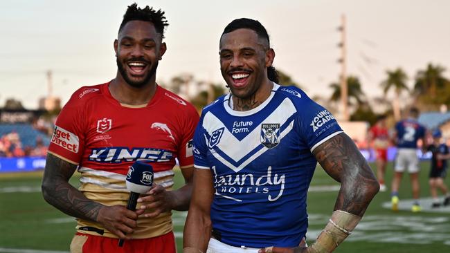 BUNDABERG, AUSTRALIA - AUGUST 17:  Hamiso Tabuai-Fidow of the Dolphins and Josh Addo-Carr of the Bulldogs in a post match interview after the round 24 NRL match between Canterbury Bulldogs and Dolphins at Salter Oval, on August 17, 2024, in Bundaberg, Australia. (Photo by Emily Barker/Getty Images)