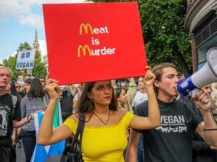 UNITED KINGDOM, London: Vegan activists hold sign-boards and chanted slogans as they marched on the Houses of Parliament and towards Hyde Park in London, United Kingdom on September 02, 2017 to fight animal abuse and oppression. (AAP Image/CrowdSpark/See LI). Picture: See LI