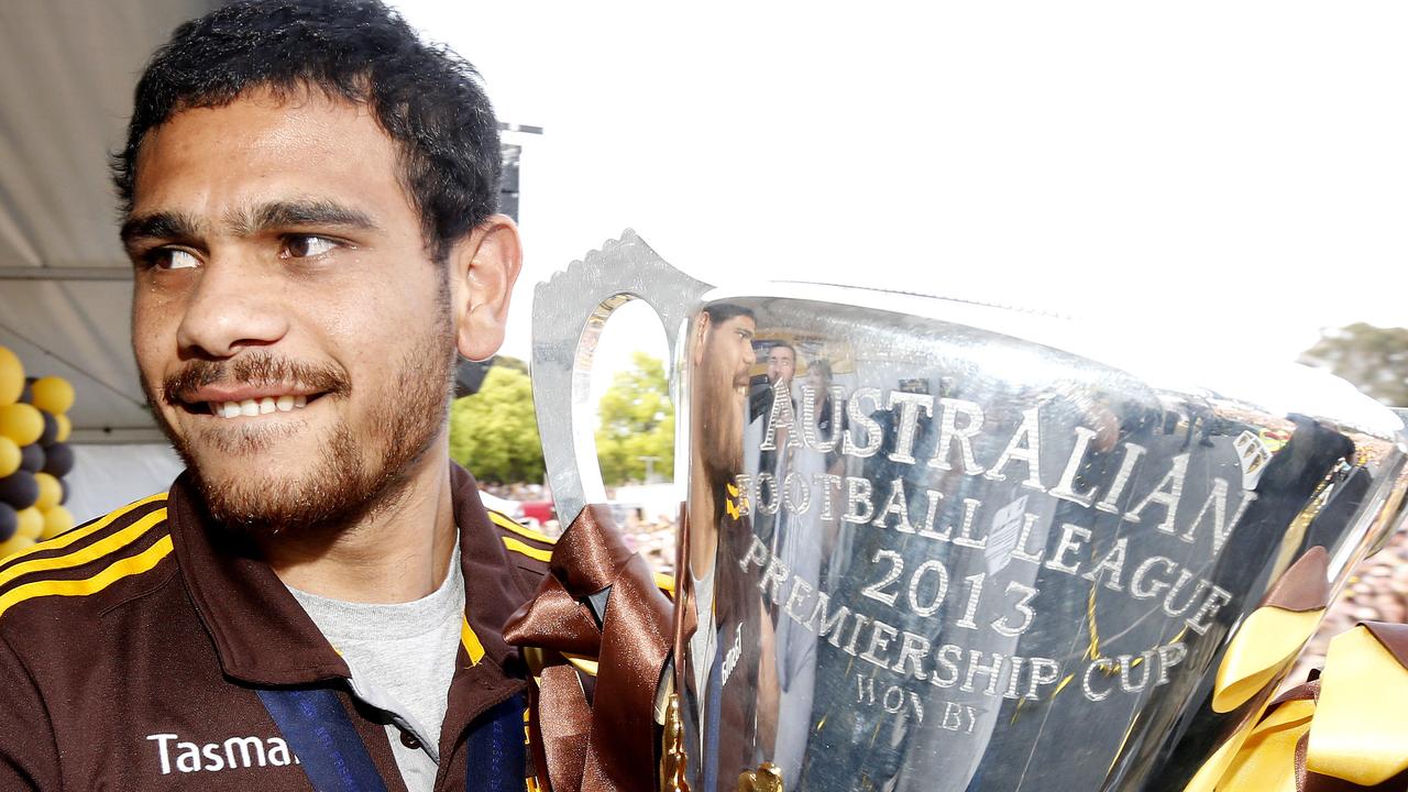 Cyril Rioli with the 2013 premiership cup.