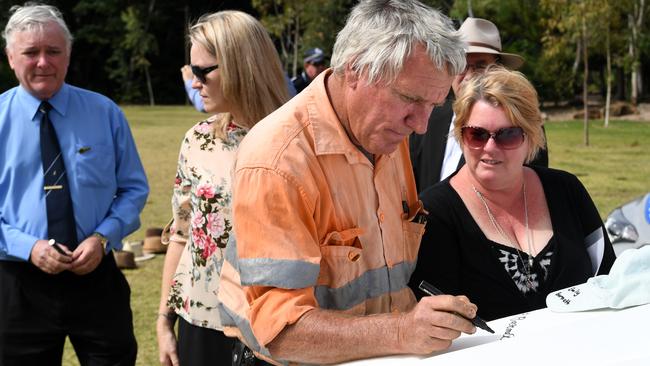 The family of Emily Barnett - uncle Leyland, aunt Davina, father Adrian and mother Stacy - signed the safety pledge at the launch of Rural Road Safety Month.