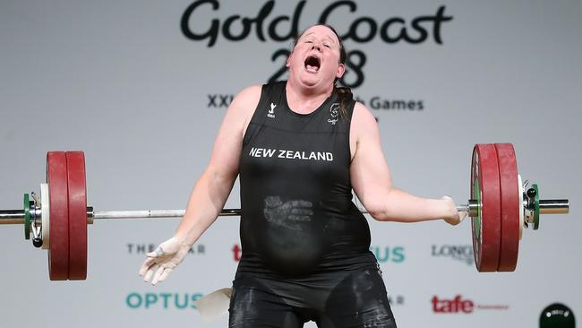 Transgender weightlifter Laurel Hubbard grimaces as she hyperextends her elbow. Picture: Getty Images