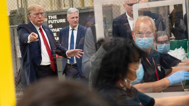 US President Donald Trump tours a Honeywell factory producing N95 masks during his first trip since widespread COVID-19 related lockdowns went into effect in Phoenix, Arizona.