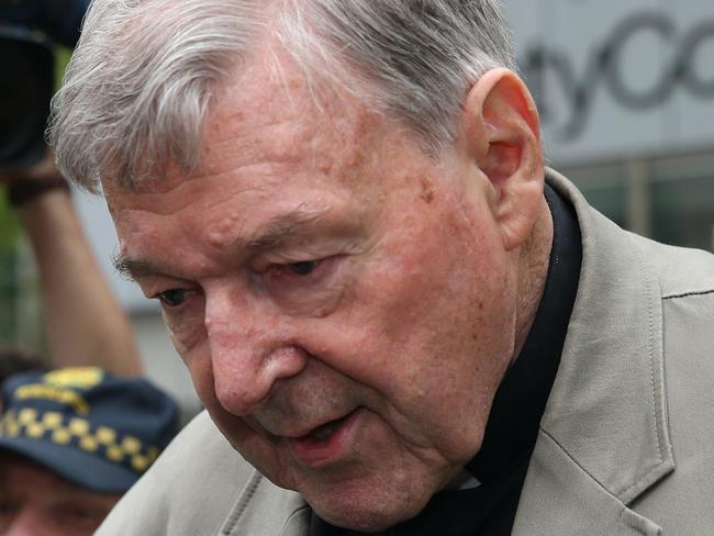 Cardinal George Pell leaves the County Court of Victoria court after prosecutors decided not to proceed with a second trial on alleged historical child sexual offences in Melbourne on February 26, 2019. - Australian Cardinal George Pell, who helped elect popes and ran the Vatican's finances, has been found guilty of sexually assaulting two choirboys, becoming the most senior Catholic cleric ever convicted of child sex crimes. (Photo by CON CHRONIS / AFP)