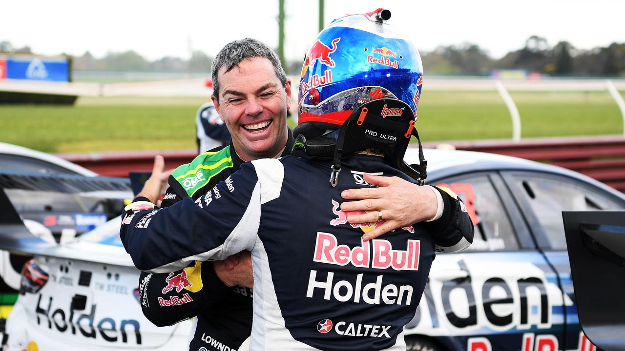 Craig Lowndes congratulates Jamie Whincup at Sandown International Motor Raceway. Picture: Daniel Kalisz/Getty Images