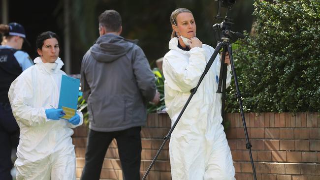 The crime scene in Hamilton South, Newcastle, where a man was shot dead at the front door of his apartment block on Tuesday night. Picture by Peter Lorimer.