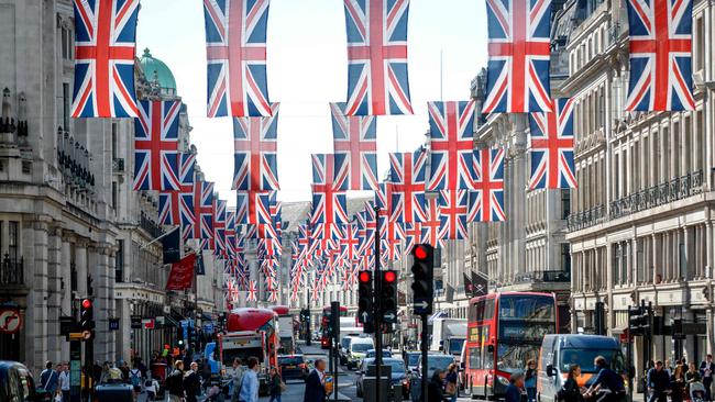 Union flag decorations on Regent St, London, ahead of the wedding. Picture: Tolga Akmen