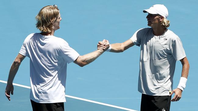 Max Purcell and Luke Saville celebrate after winning their doubles match against Ivan Dodig and Filip Polasek. Picture: Getty Images